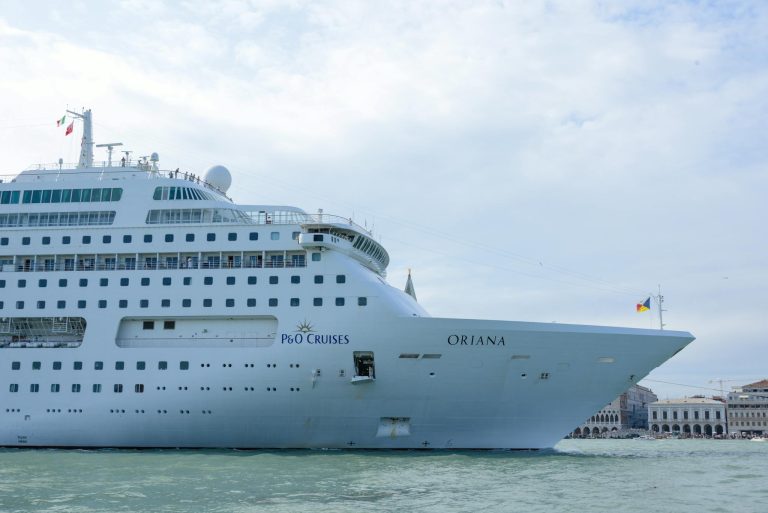 Luxurious cruise ship Oriana sailing through the waters, showcasing elegance and travel.